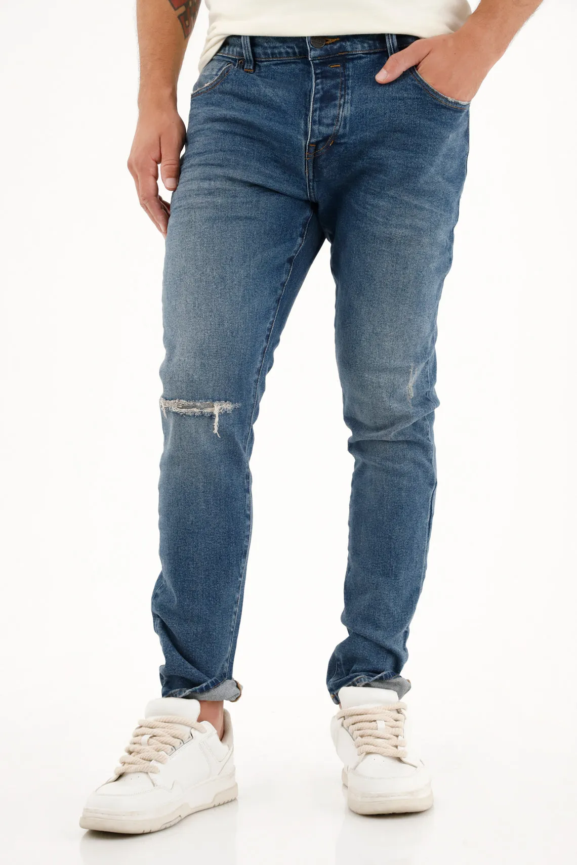 Jean Skinny tiro medio con roto localizado para hombre